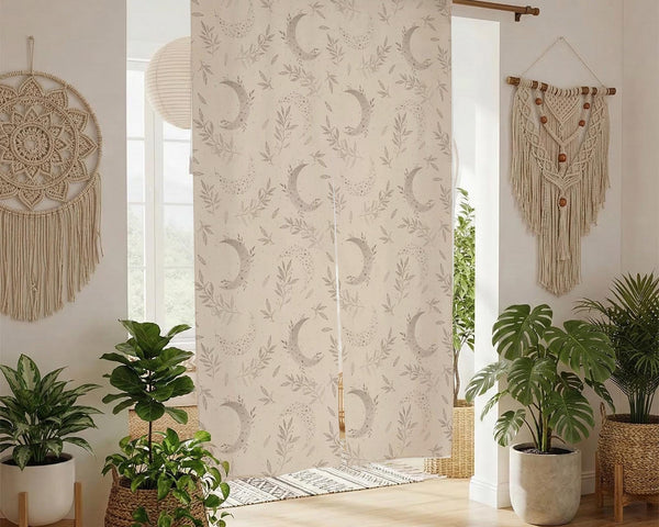 Beige door curtain with a crescent moon, leafy botanical branches, gray line art, and dotted celestial details.