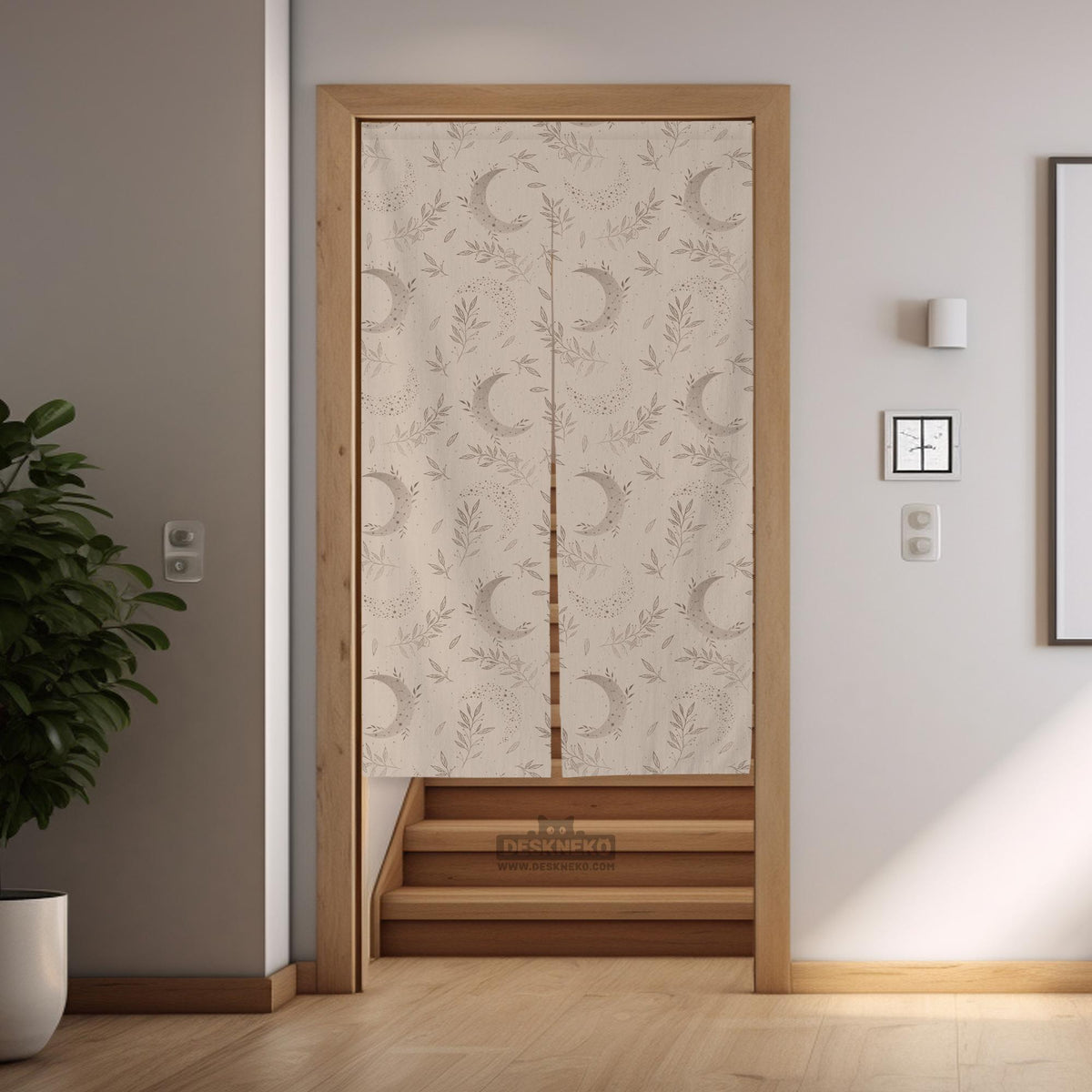 Beige door curtain with a crescent moon, leafy botanical branches, gray line art, and dotted celestial details.