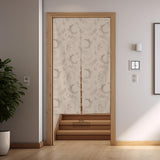Beige door curtain with a crescent moon, leafy botanical branches, gray line art, and dotted celestial details.