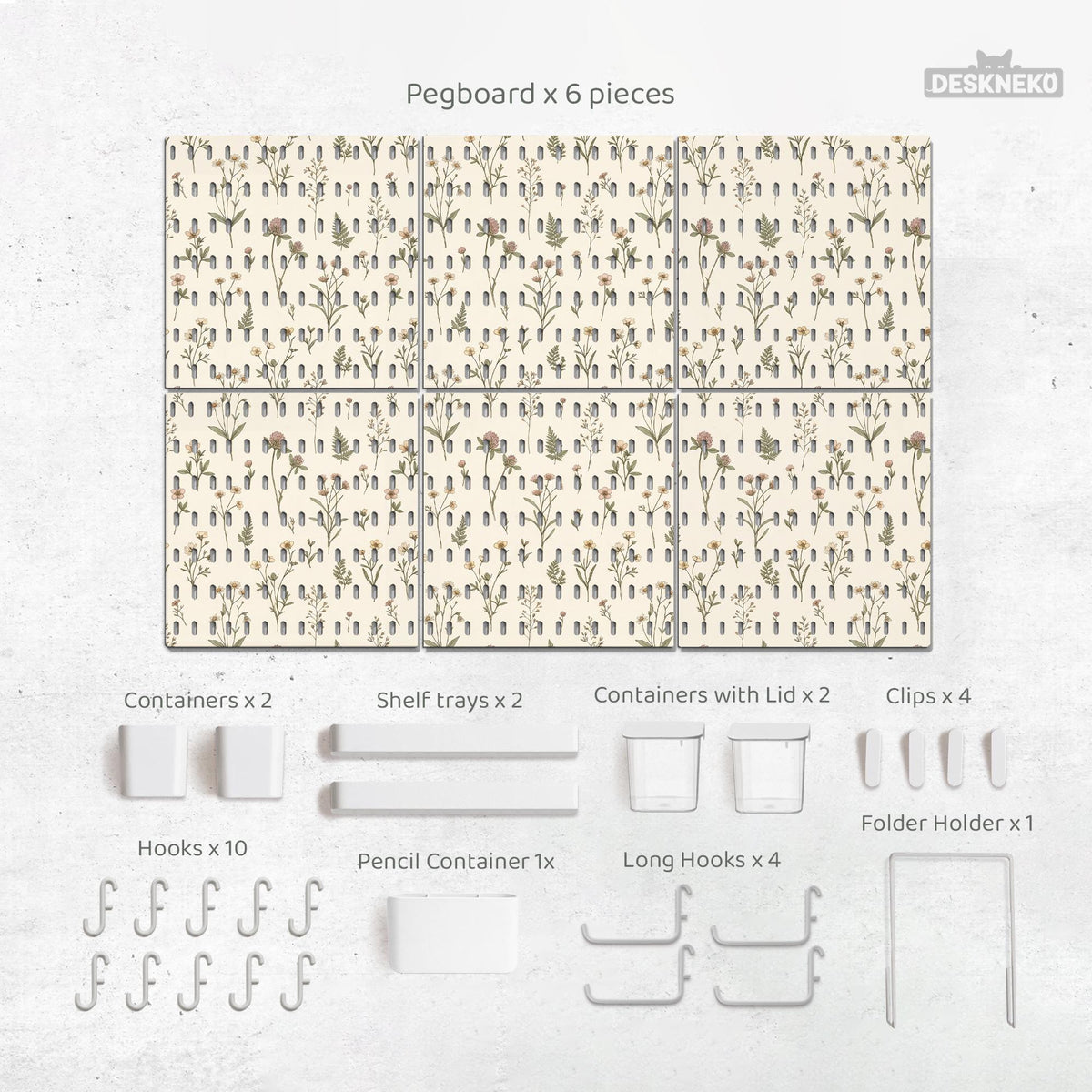 Cream pegboard wall organizer with small floral print, sage green stems, black slot layout, shelves, hooks, clips, and containers.