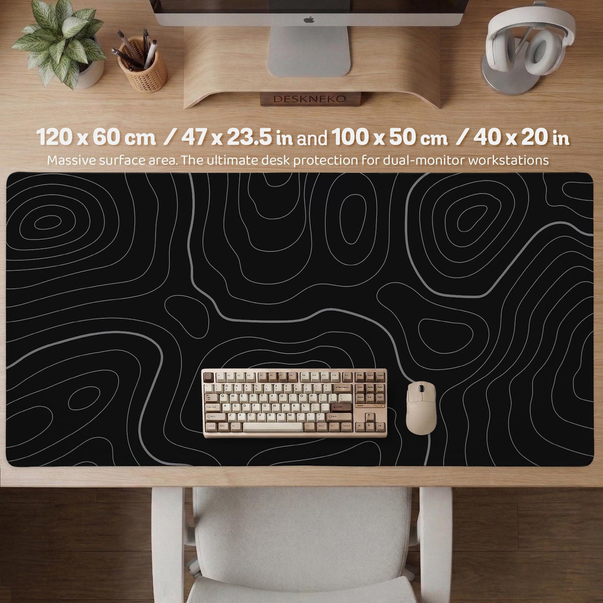 Black desk mat with a thin gray topographic contour line pattern.