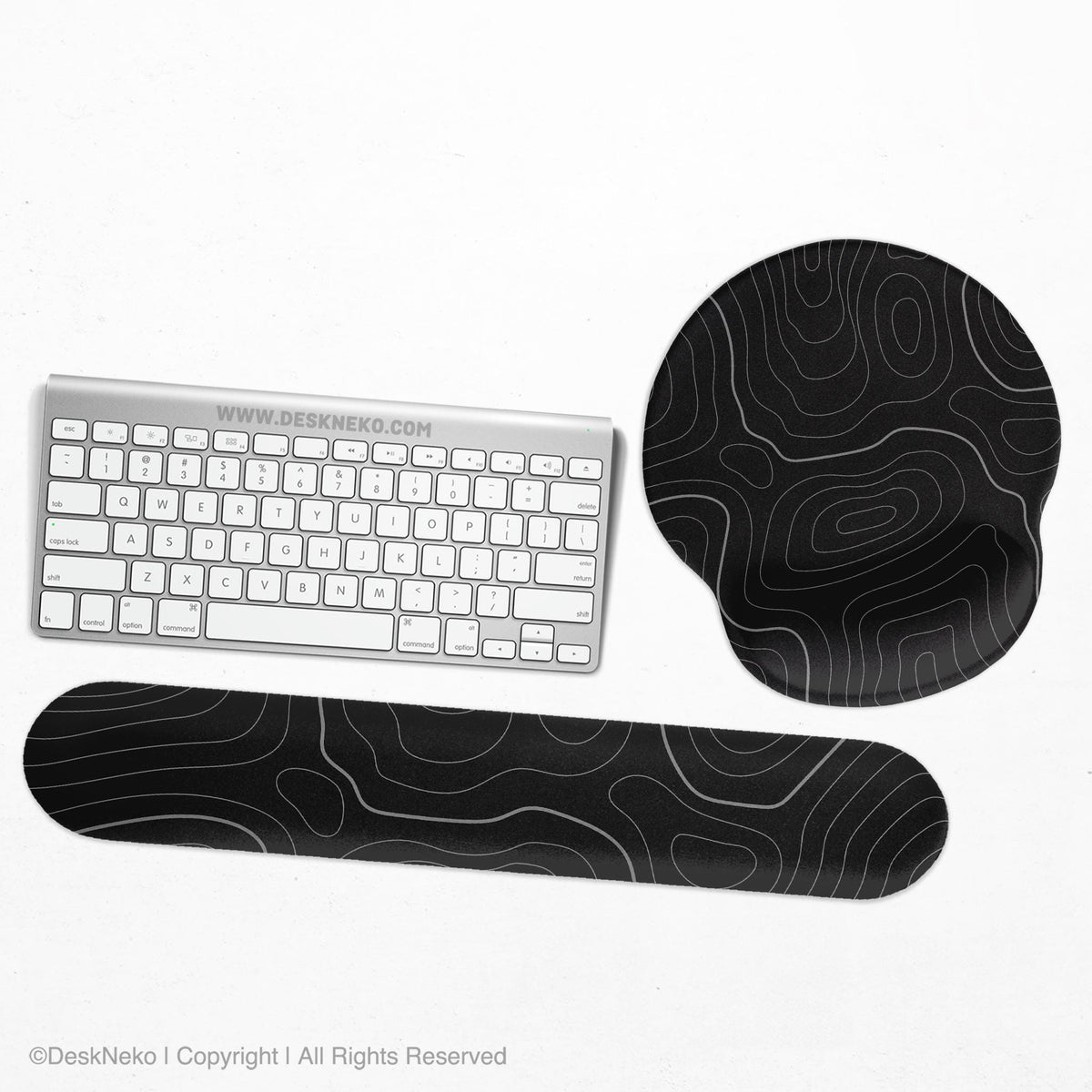 Black mousepad with a gray topographic contour line pattern shown with matching keyboard wrist rest options.