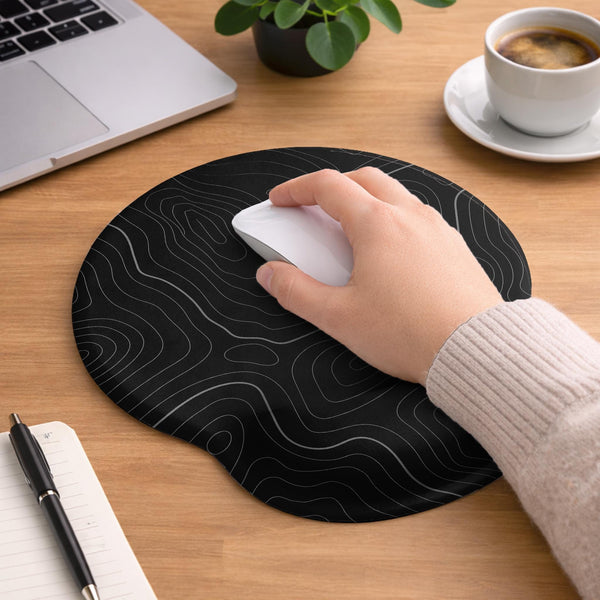 Black mousepad with a gray topographic contour line pattern shown with matching keyboard wrist rest options.
