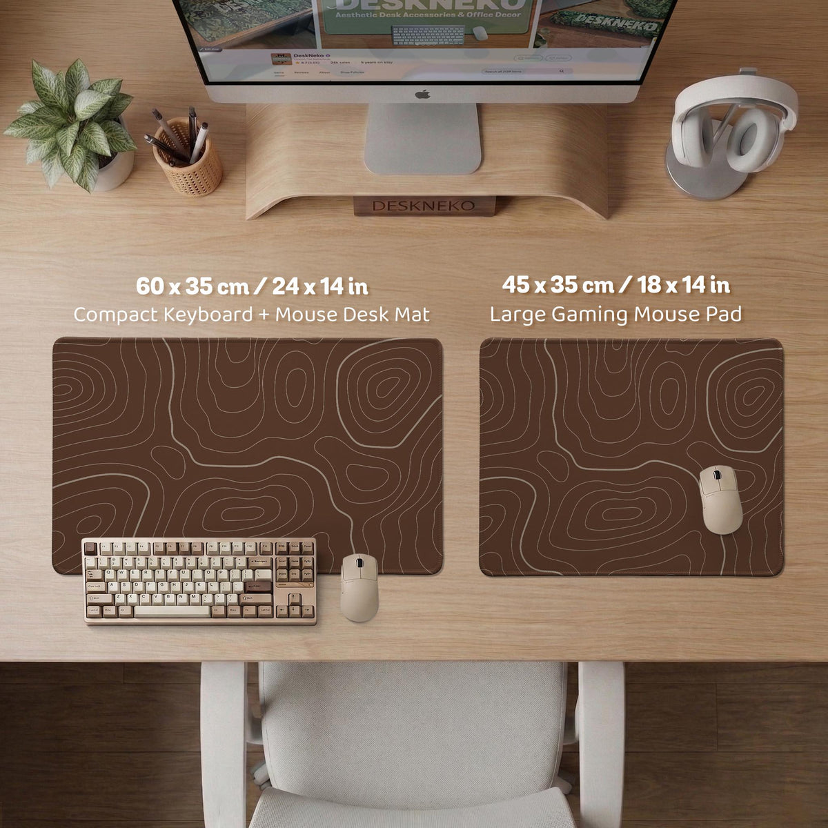 Brown desk mat with a repeating topographic contour line pattern in a neutral earth tone design.