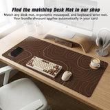 Brown mousepad and keyboard wrist rest with a topographic contour-line pattern.