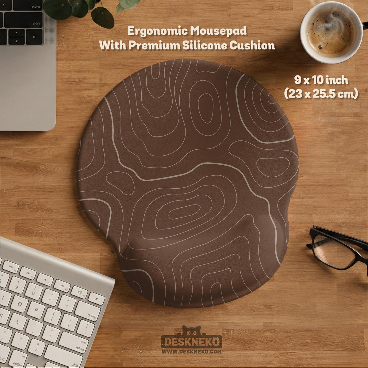Brown mousepad and keyboard wrist rest with a topographic contour-line pattern.