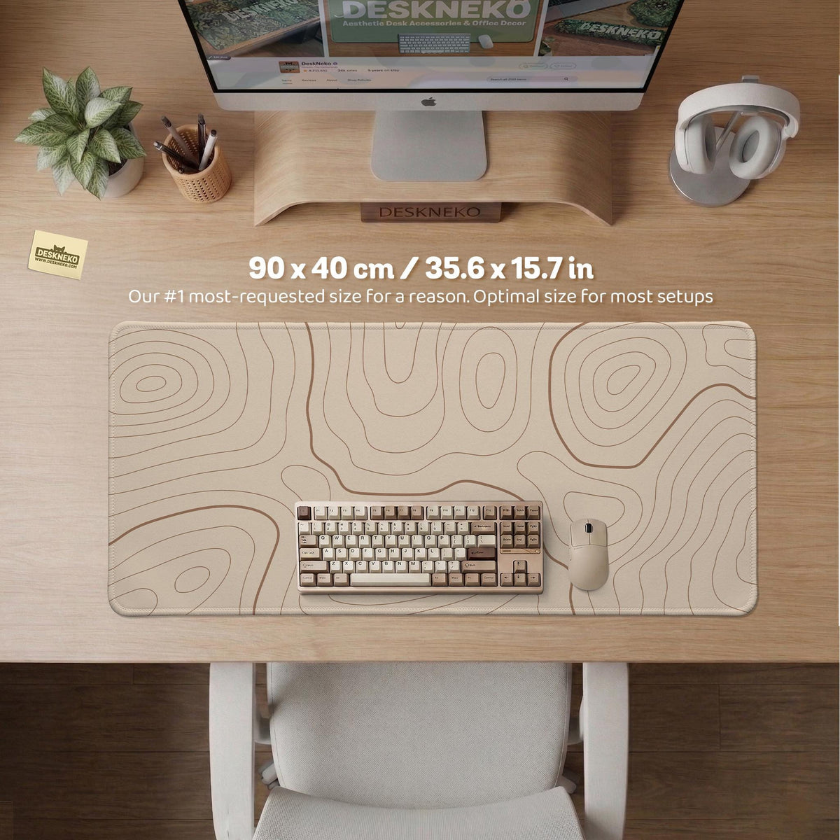 A beige mousepad with a topographic line pattern in a repeating design.