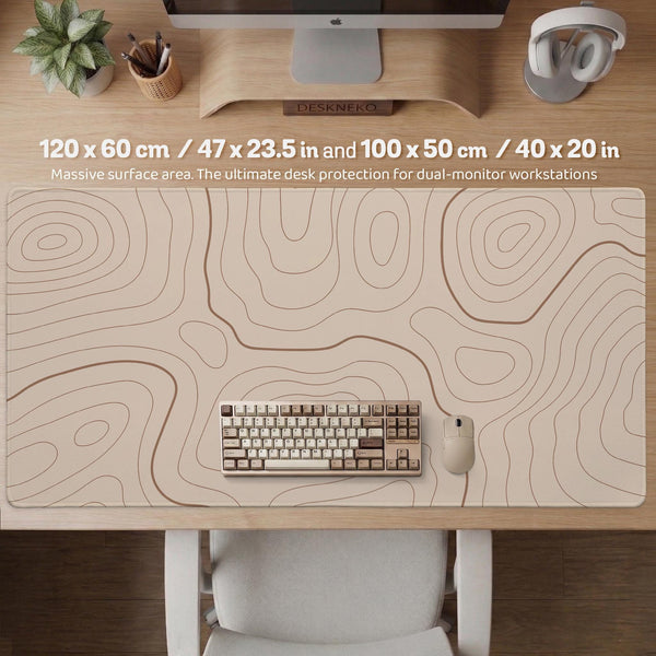 Beige desk mat with soft brown topographic contour lines on a neutral background.