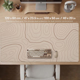 Beige desk mat with soft brown topographic contour lines on a neutral background.