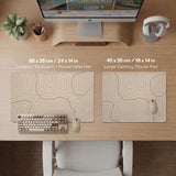 Beige desk mat with soft brown topographic contour lines on a neutral background.