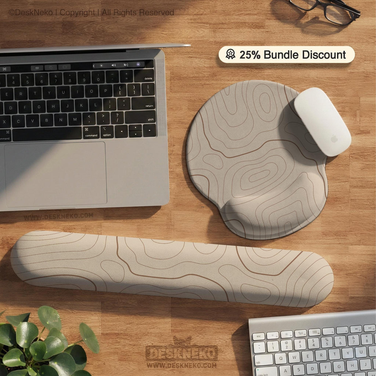 Beige desk mat with soft brown topographic contour lines on a neutral background.