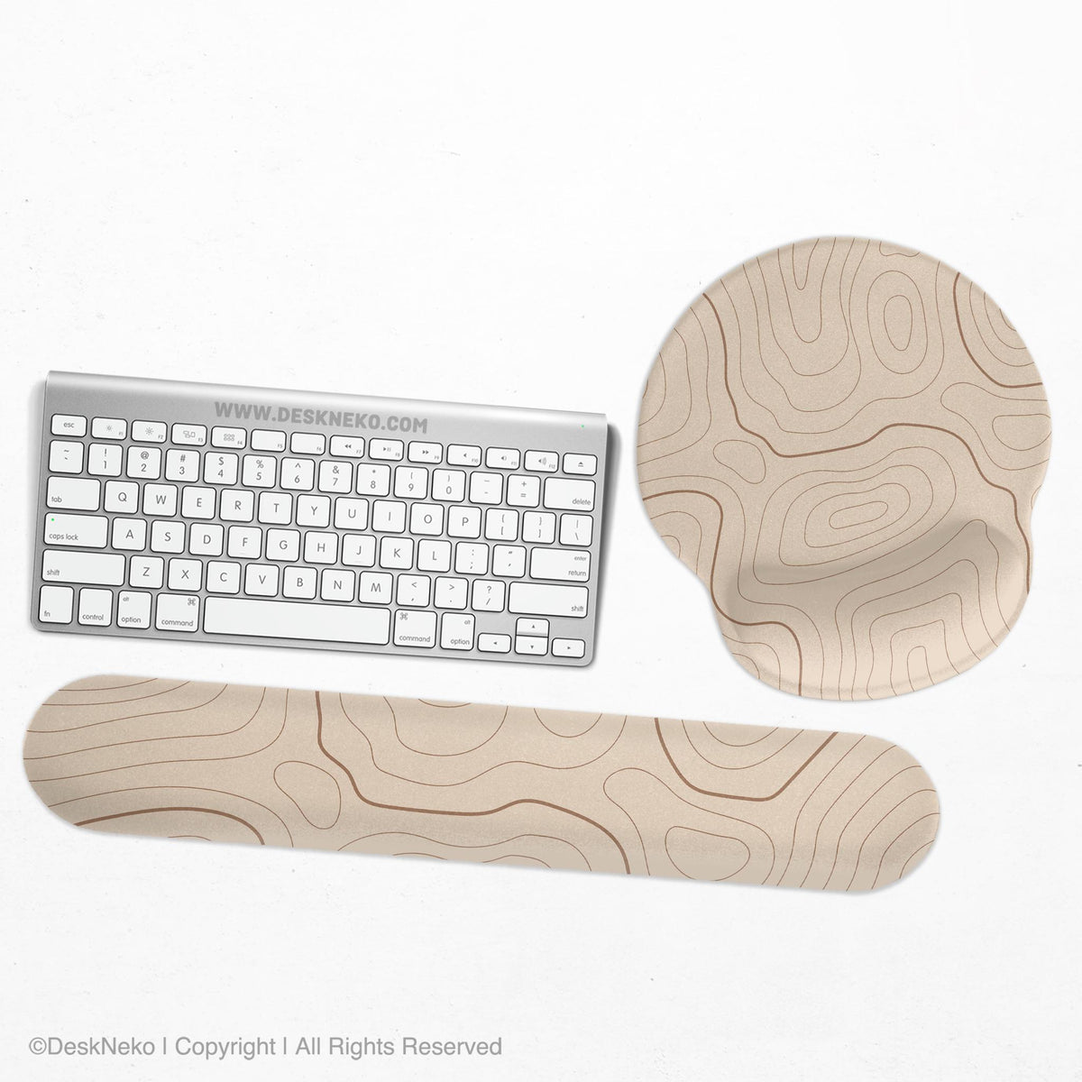 Beige mousepad and keyboard wrist rest with a topographic line pattern shown in a neutral desk setup.