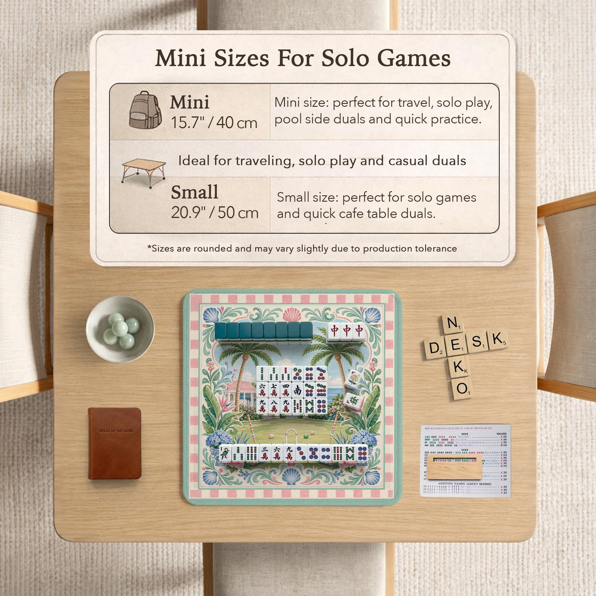 Pastel mahjong mat with a pink gingham border, seashells, hydrangea pots, palm trees, croquet details, and a coastal garden scene.