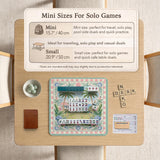 Pastel mahjong mat with a pink gingham border, seashells, hydrangea pots, palm trees, croquet details, and a coastal garden scene.