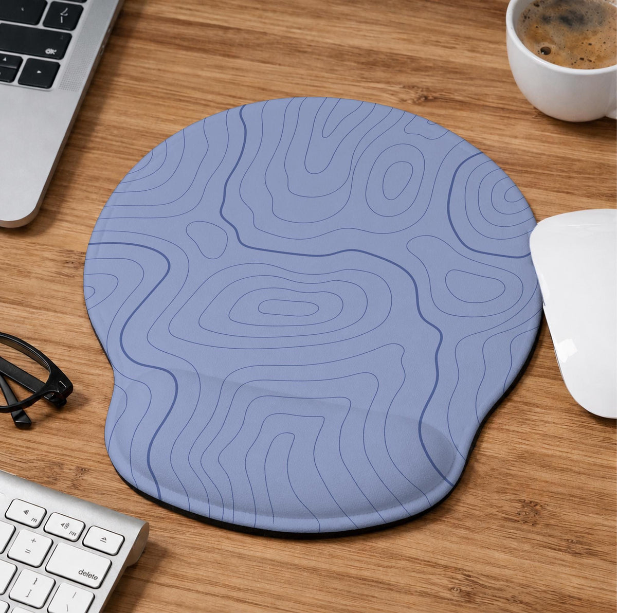 Periwinkle ergonomic mousepad and keyboard wrist rest with a light blue topographic contour line pattern.