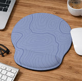 Periwinkle ergonomic mousepad and keyboard wrist rest with a light blue topographic contour line pattern.