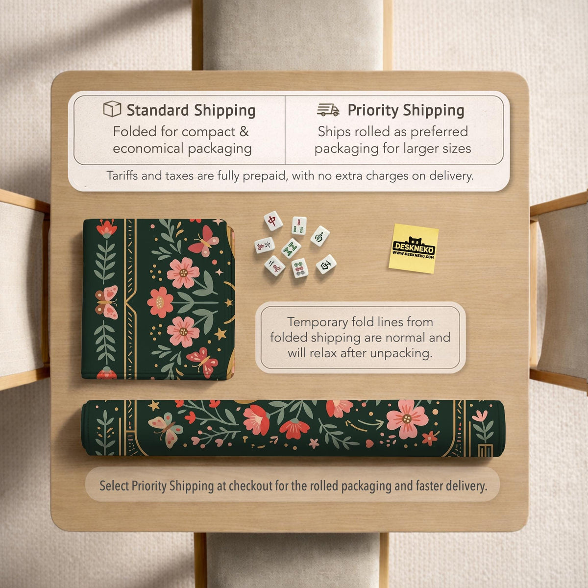 Dark green square mahjong mat with floral branches, small red blossoms, gold line details, and a large moth in the center.