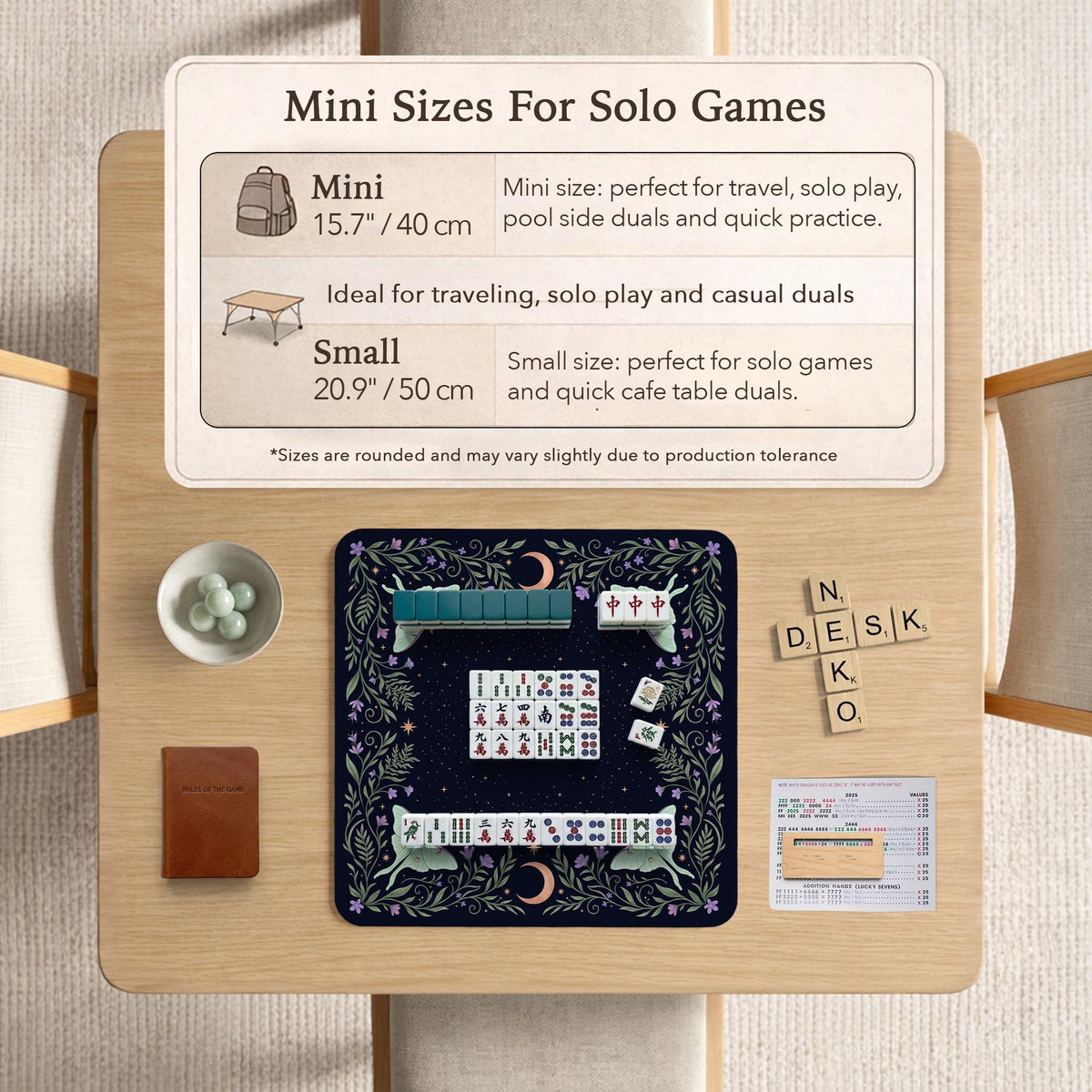 Navy square mahjong mat with a floral border, copper moons, scattered stars, pale moths, and leafy botanical details.
