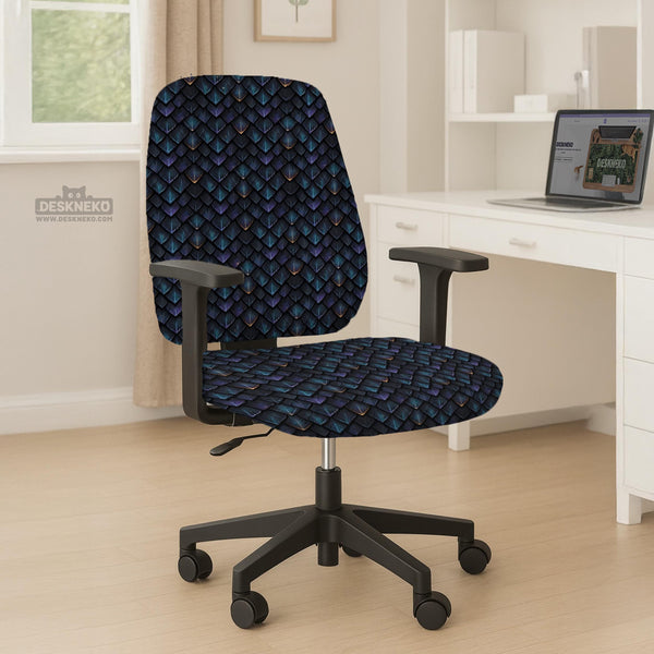 An indigo desk chair cover with a dragon scale pattern in blue, navy, purple, and copper tones, shown as a stretch slipcover with coverage options.