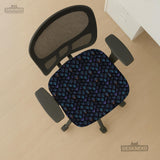 An indigo desk chair cover with a dragon scale pattern in blue, navy, purple, and copper tones, shown as a stretch slipcover with coverage options.