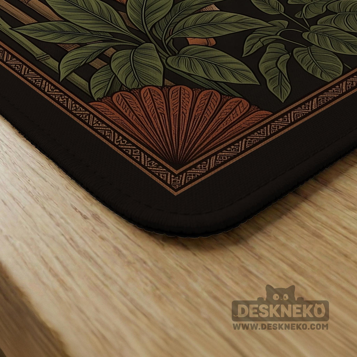 Black square mahjong mat with mirrored tiger faces, bamboo, dark tropical leaves, ornate border details, and orange accents.