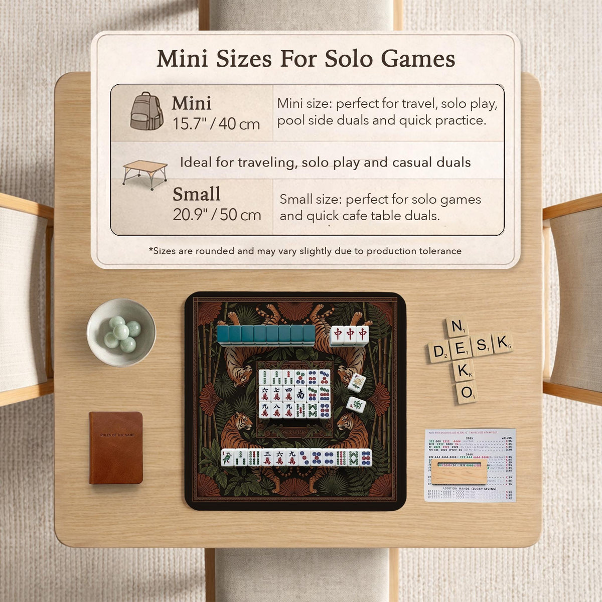 Black square mahjong mat with mirrored tiger faces, bamboo, dark tropical leaves, ornate border details, and orange accents.