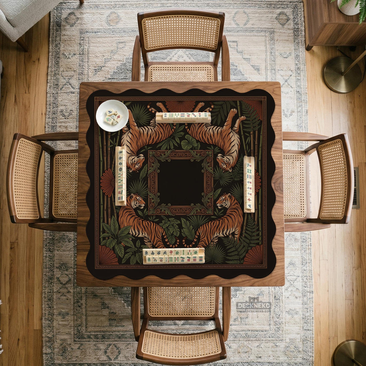 Black square mahjong mat with mirrored tiger faces, bamboo, dark tropical leaves, ornate border details, and orange accents.