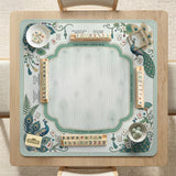 Teal square mahjong mat with peacock feathers, soft floral pattern, tassel details, and printed rule guide text in the center.
