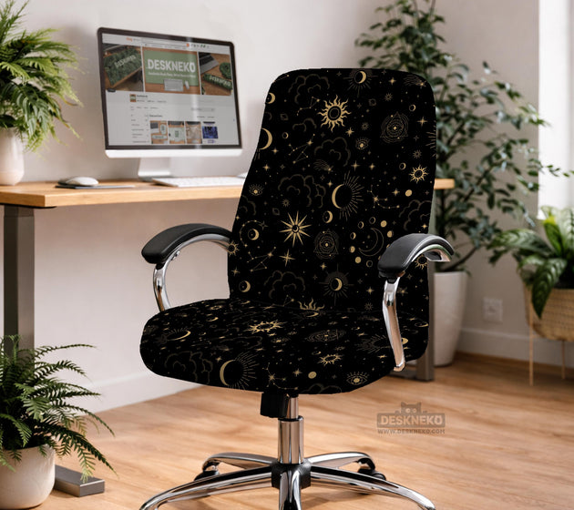 Black chair cover with a gold astrology print of moons, suns, stars, and symbols on a gaming chair.