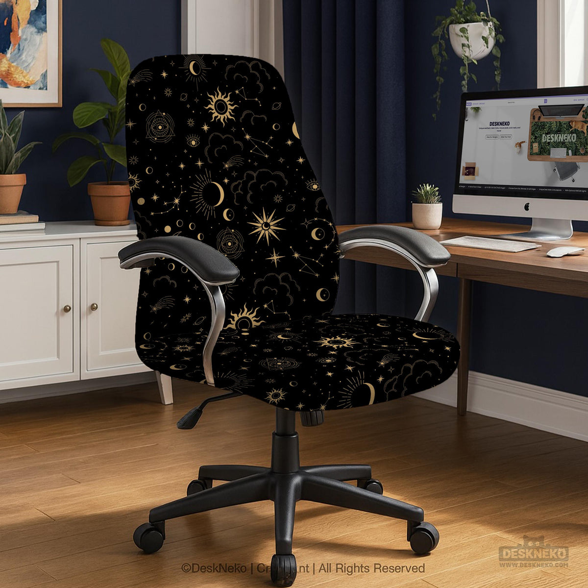 Black chair cover with a gold astrology print of moons, suns, stars, and symbols on a gaming chair.