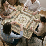 Square mahjong table mat with vintage bird artwork, floral border detail, and sage green, cream, muted blue, and terracotta tones.