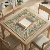 Square mahjong table mat with vintage bird artwork, floral border detail, and sage green, cream, muted blue, and terracotta tones.