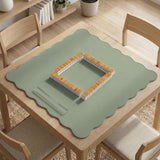 A plain light sage green square mahjong mat with a smooth solid-color surface.