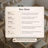 A plain light sage green square mahjong mat with a smooth solid-color surface.