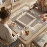 Beige and gold square mahjong mat with a bamboo pattern and geometric border.