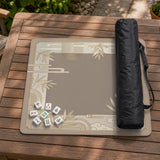 Beige and gold square mahjong mat with a bamboo pattern and geometric border.