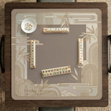 Beige and gold square mahjong mat with a bamboo pattern and geometric border.