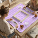 Lavender gingham mahjong mat with a scalloped edge and a pastel check pattern.