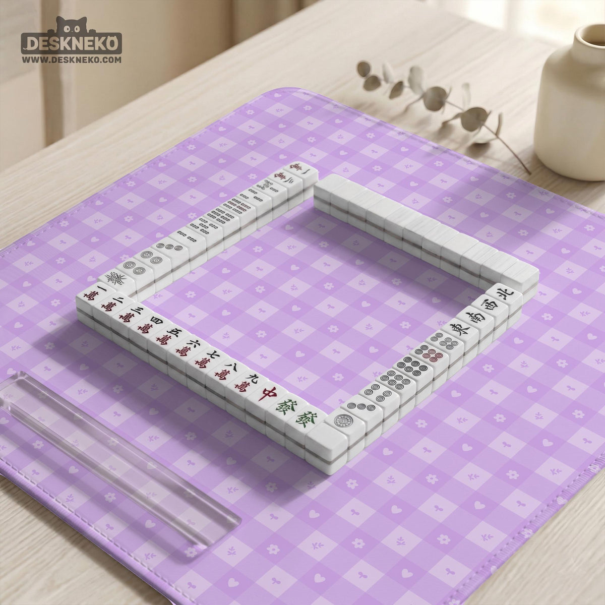 Lavender gingham mahjong mat with a scalloped edge and a pastel check pattern.