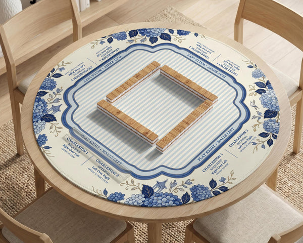 Blue and white mahjong table mat with a floral border, small birds, pagoda details, striped center, and printed rules around the edge.