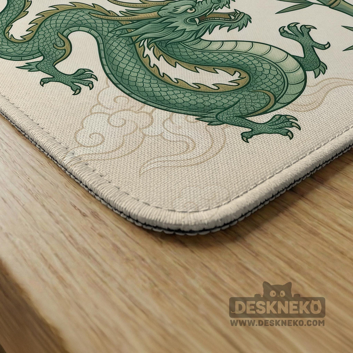 Sage green mahjong mat with a bamboo pattern, dragon design, printed rules around the edge, and a scalloped edge option.