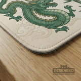 Sage green mahjong mat with a bamboo pattern, dragon design, printed rules around the edge, and a scalloped edge option.