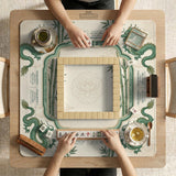 Sage green mahjong mat with a bamboo pattern, dragon design, printed rules around the edge, and a scalloped edge option.