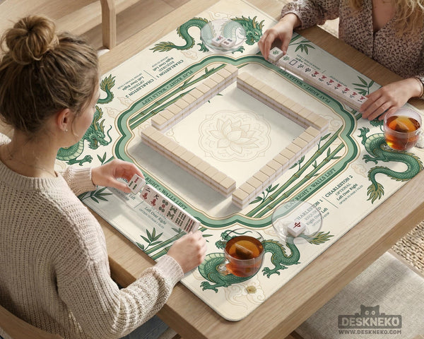 Sage green mahjong mat with a bamboo pattern, dragon design, printed rules around the edge, and a scalloped edge option.