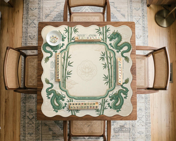 Sage green mahjong mat with a bamboo pattern, dragon design, printed rules around the edge, and a scalloped edge option.