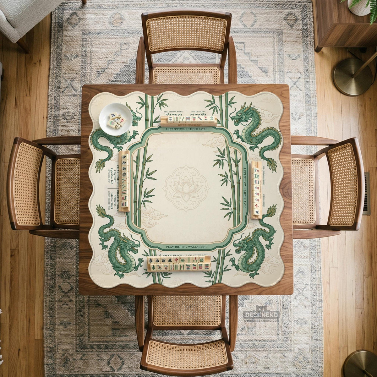 Sage green mahjong mat with a bamboo pattern, dragon design, printed rules around the edge, and a scalloped edge option.