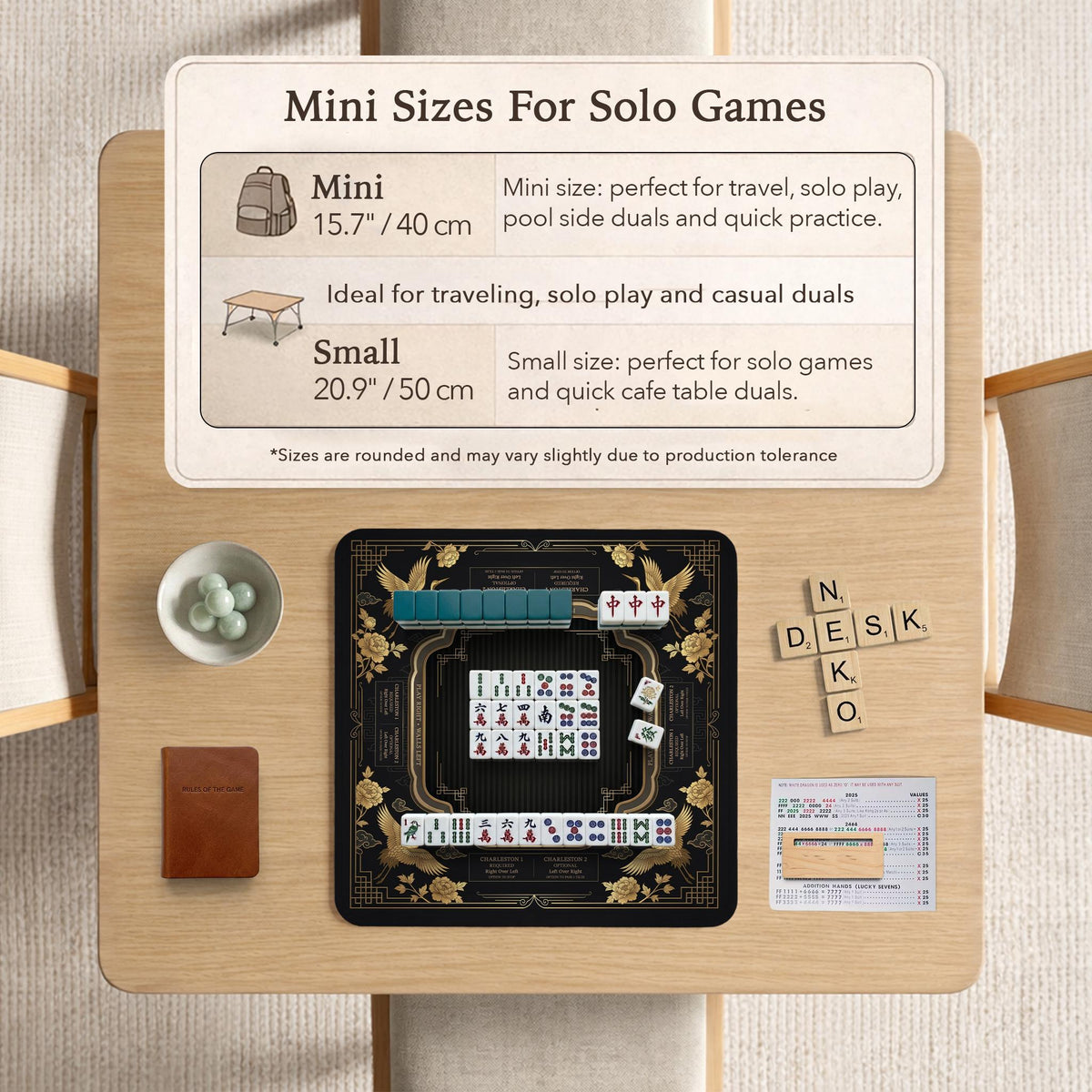 Black and gold square mahjong mat with an art deco crane and floral border, rule reminders around the edges, and a blank center area.