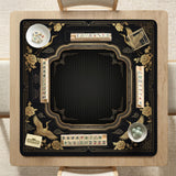 Black and gold square mahjong mat with an art deco crane and floral border, rule reminders around the edges, and a blank center area.