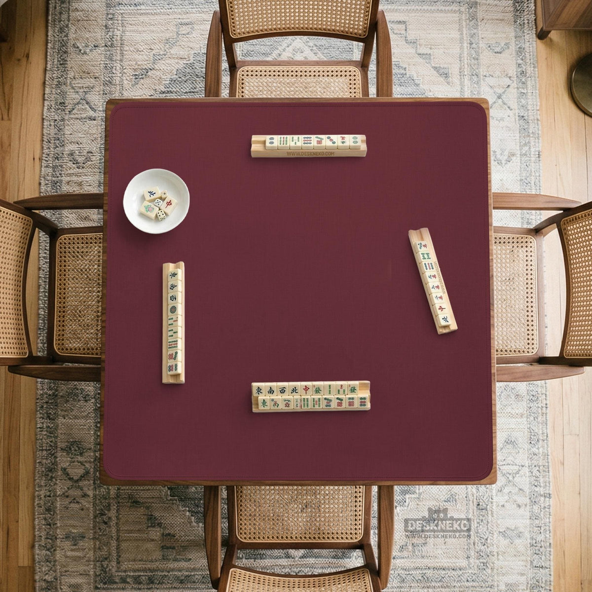 Plain burgundy square mahjong mat with scalloped edges on a white background.