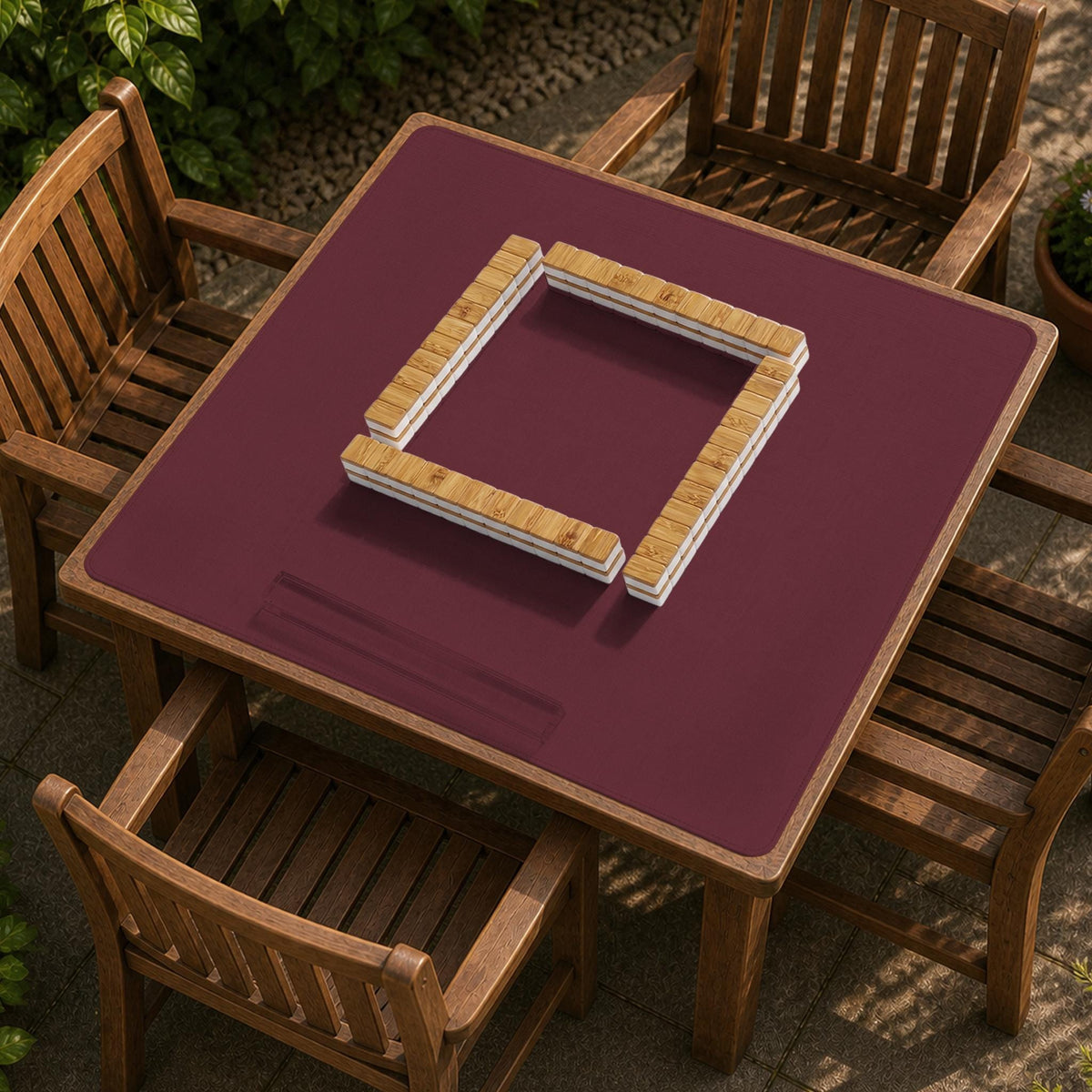 Plain burgundy square mahjong mat with scalloped edges on a white background.
